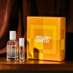 reflections of rum holiday set includes dark rum eau de parfum. 1.7 fl. oz.  / 50ml and dark rum perfume oil. 0.2 fl. oz. / 7ml